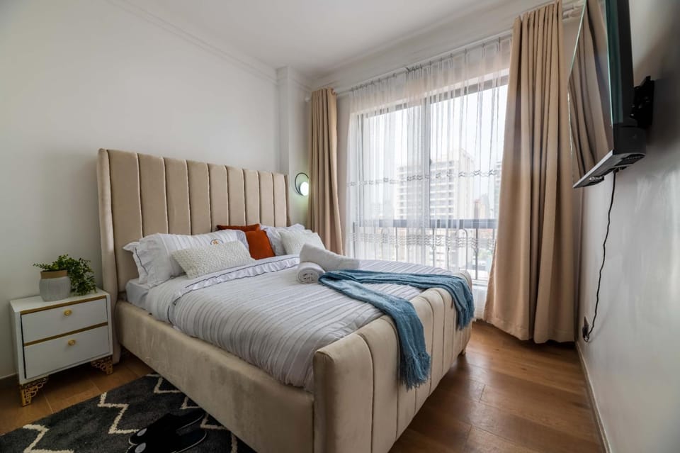 Elegant escape apartment with free parking space,fully equipped gym, swimming pool children playing ground area and amazing city views Apartment in Nairobi