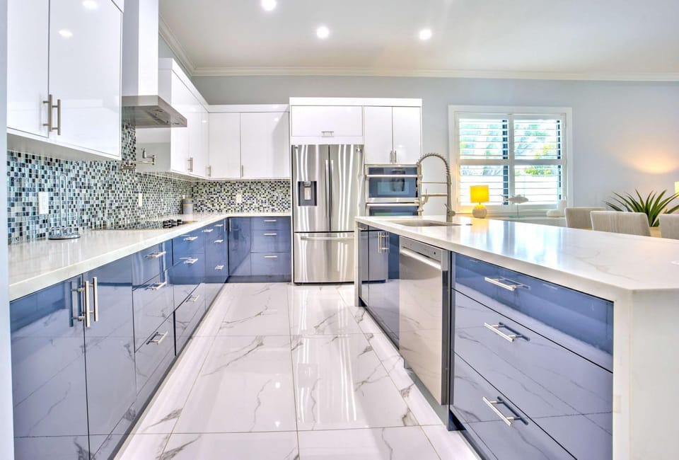 Kitchen or kitchenette, dishwasher, oven, stove