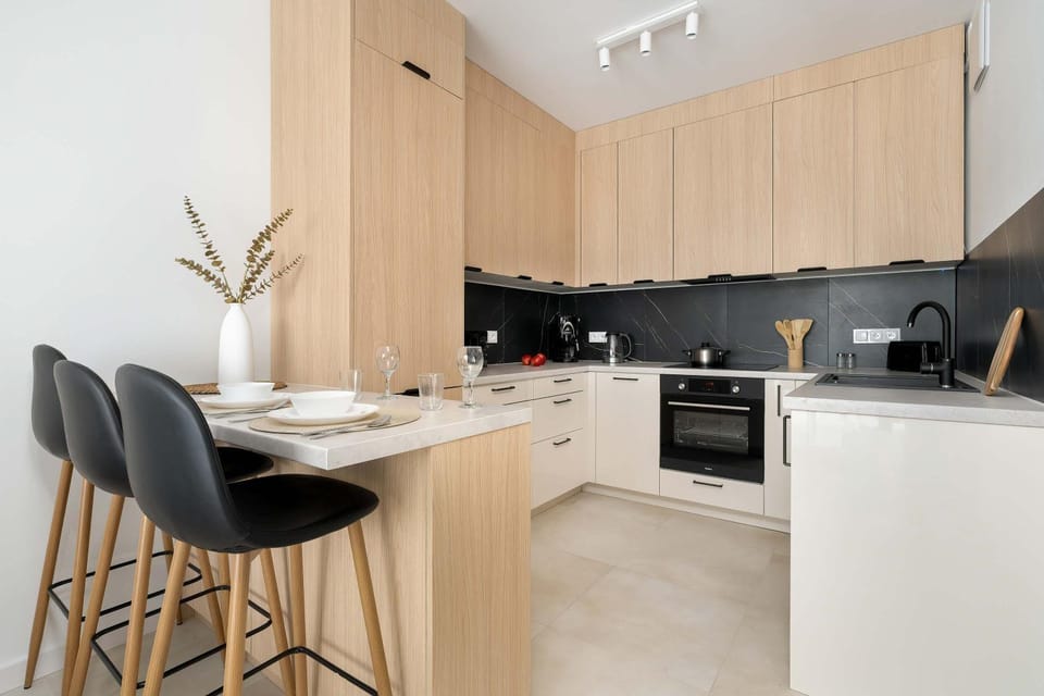 Kitchen or kitchenette, dishwasher, oven, stove, toaster