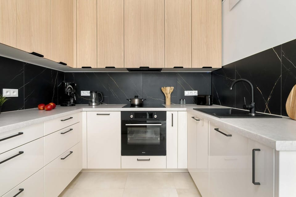Kitchen or kitchenette, dishwasher, stove, toaster