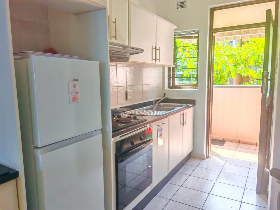 Kitchen or kitchenette, oven, stove