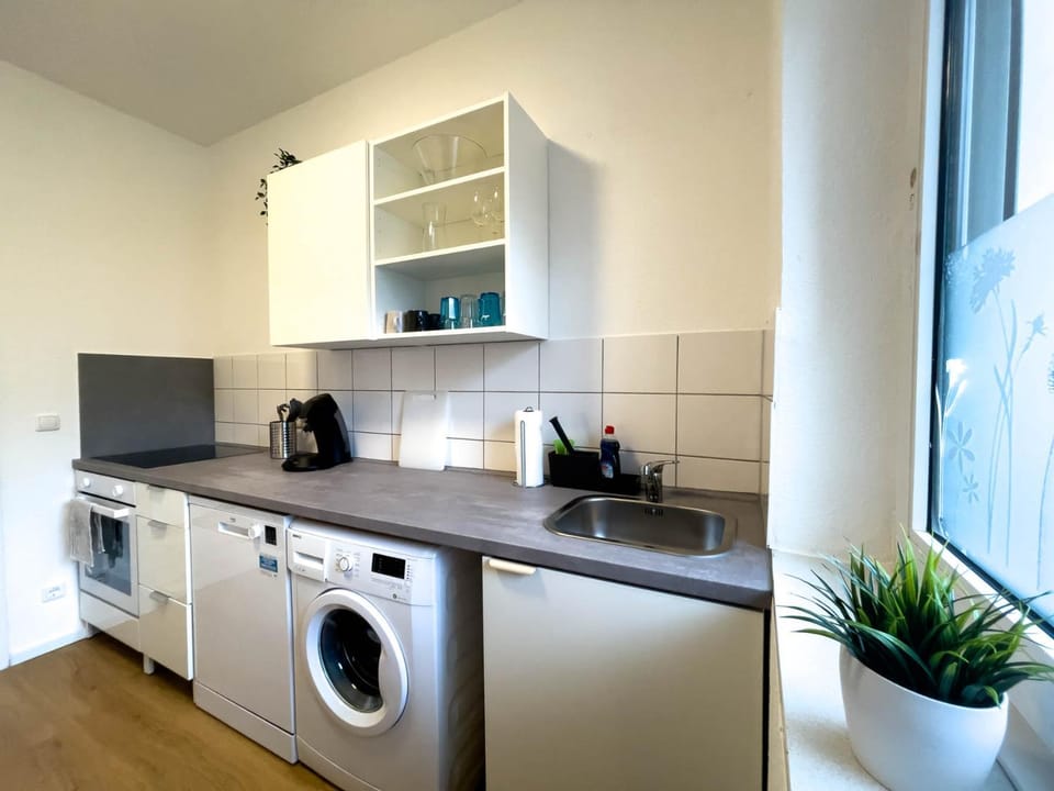Kitchen or kitchenette, dishwasher, stove, washing machine, kitchen