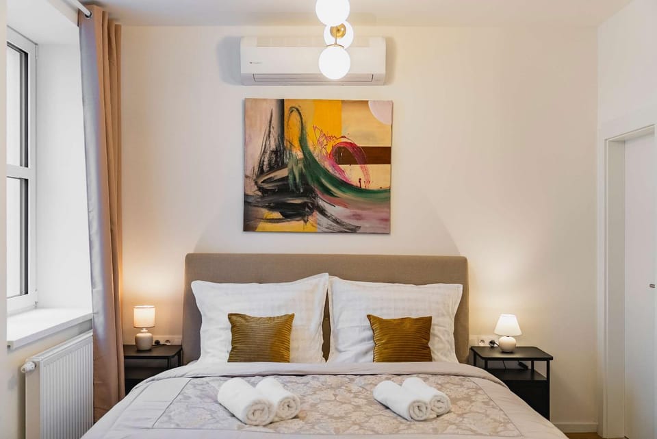 Bed, Decorative detail, Bedroom, towels, air conditioner