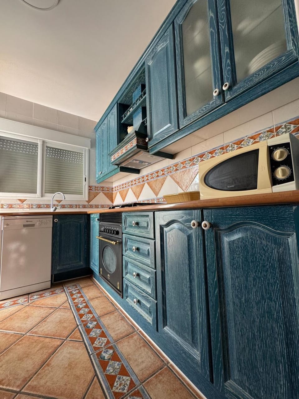 Kitchen or kitchenette, oven, stove