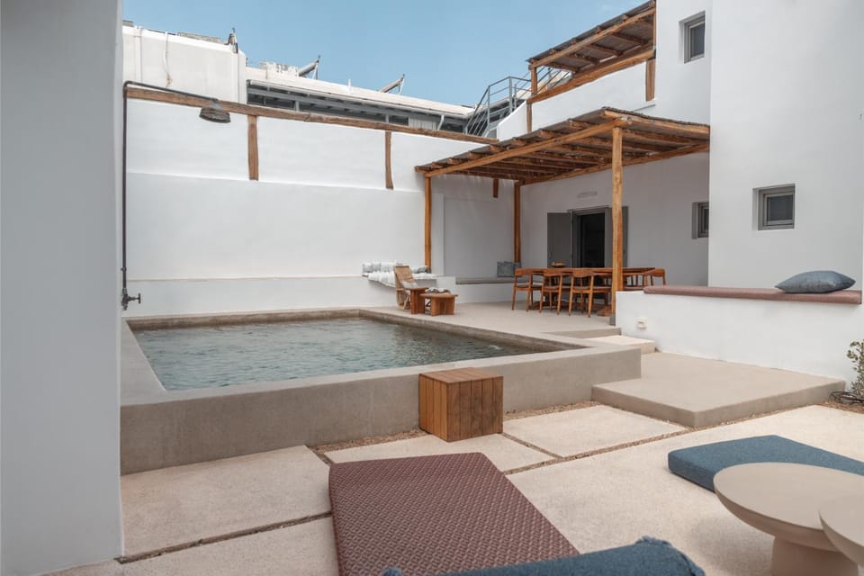 Property building, Patio, Day, View (from property/room), Seating area, Pool view, Swimming pool