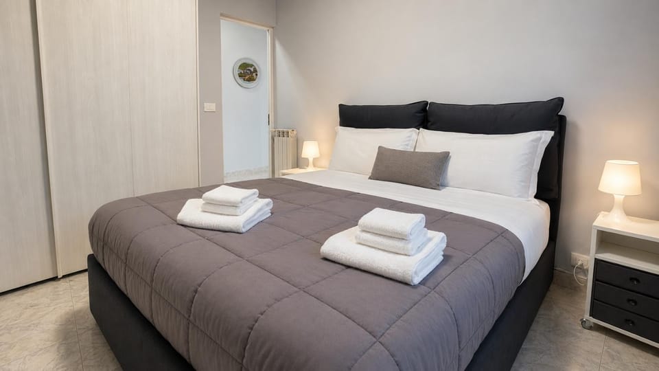 Bed, Photo of the whole room, Bedroom, towels, wardrobe