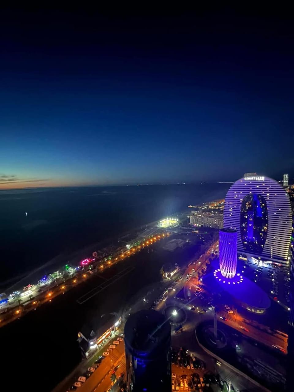 Property building, Nearby landmark, Night, Property logo or sign, Natural landscape, Bird's eye view, City view, Sea view