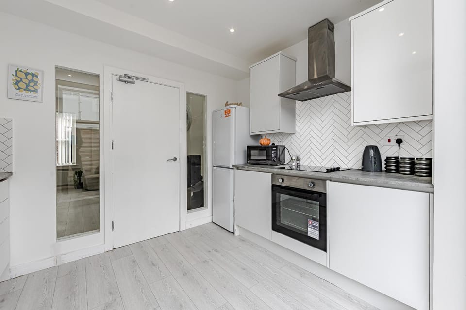 Kitchen or kitchenette, oven, stove, toaster