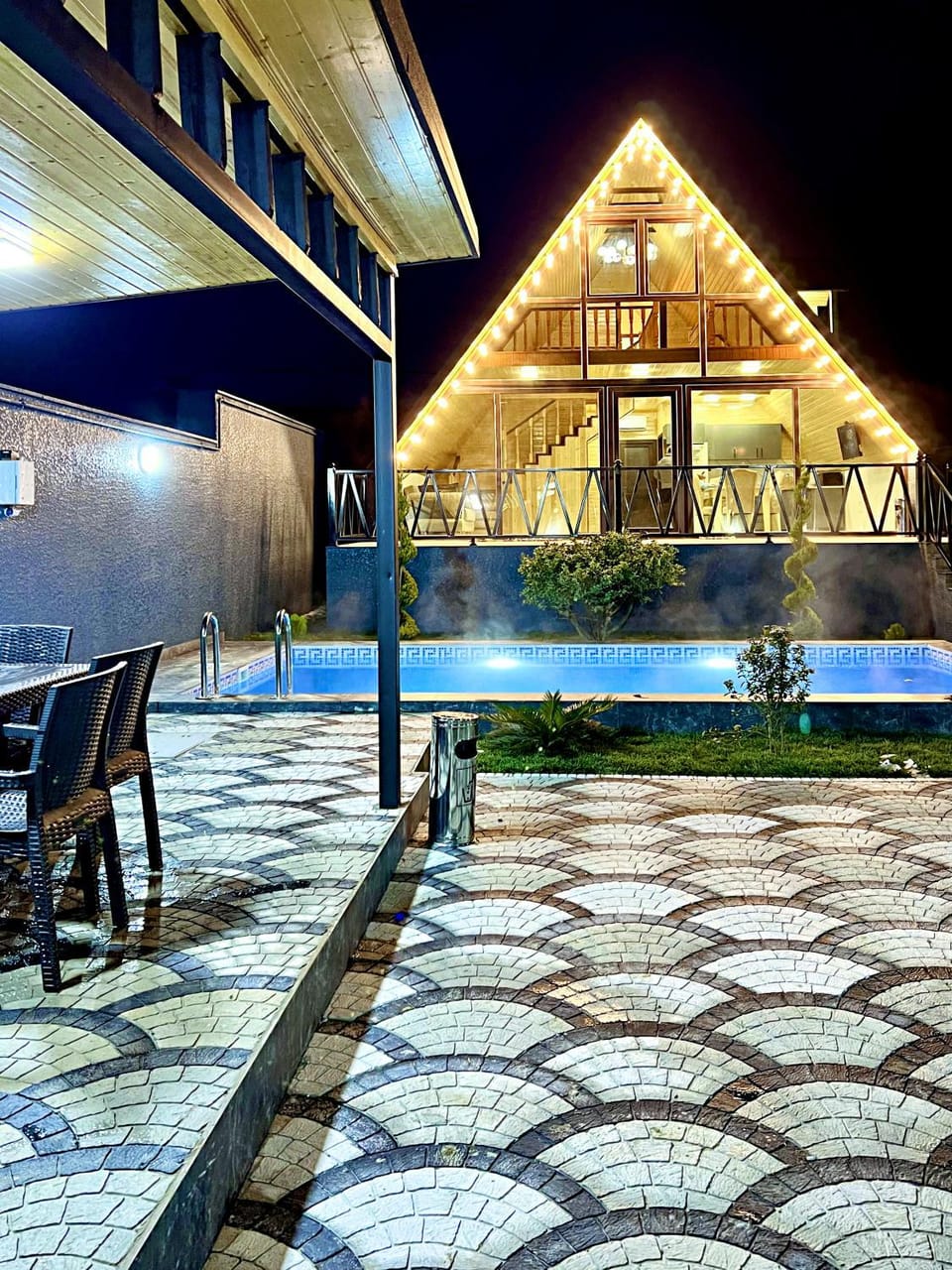 Property building, Patio, Night, Pool view, Swimming pool, sunbed