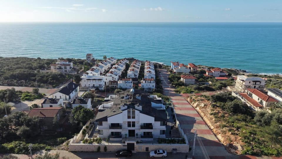 Property building, Off site, Day, Neighbourhood, Natural landscape, Bird's eye view, View (from property/room), Beach, City view, Sea view, Street view, Time of day, Location, Parking