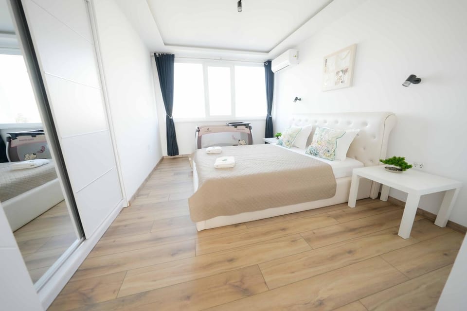 Bed, Photo of the whole room, Bedroom, towels, air conditioner