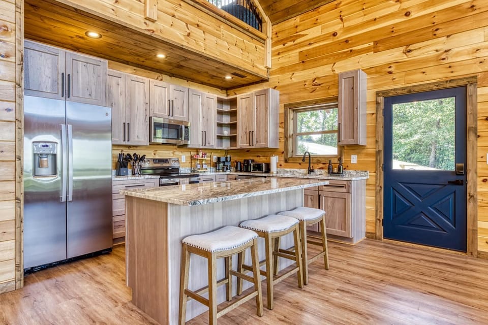 Kitchen or kitchenette, dishwasher, oven, stove, toaster