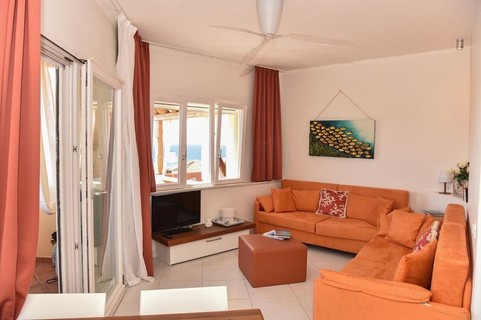 TV and multimedia, Living room, Seating area, Landmark view, Landmark view, Sea view