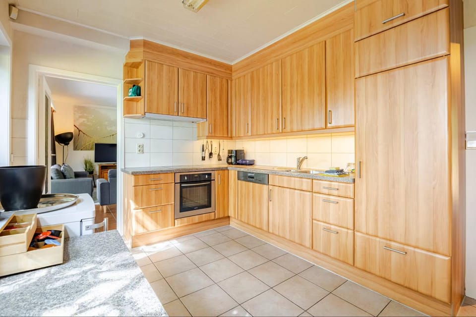 Kitchen or kitchenette, dishwasher, oven, stove