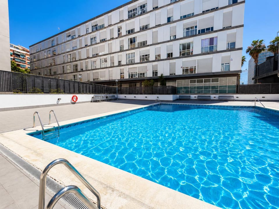 Property building, Day, Pool view, Swimming pool, sunbed
