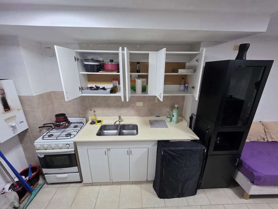 Kitchen or kitchenette, washing machine