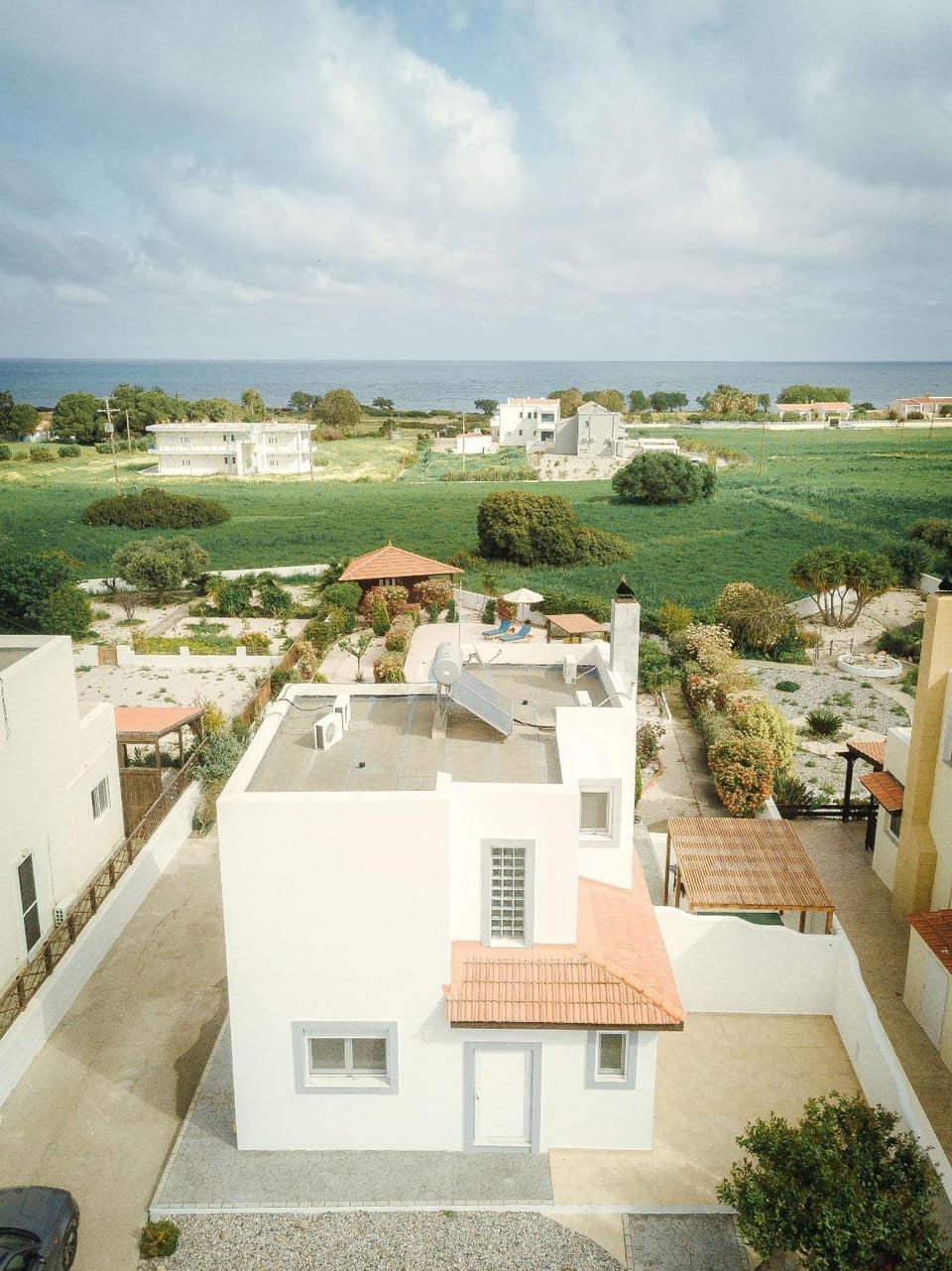 Property building, Patio, Natural landscape, Garden, Other, Beach, Area and facilities, Swimming pool, Parking, sunbed