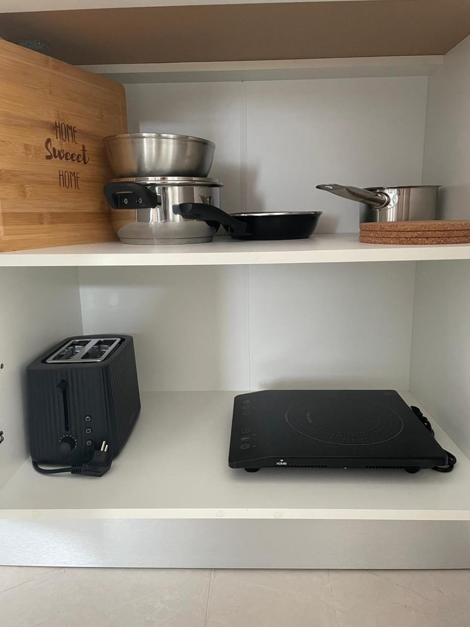 Kitchen or kitchenette, stove, toaster
