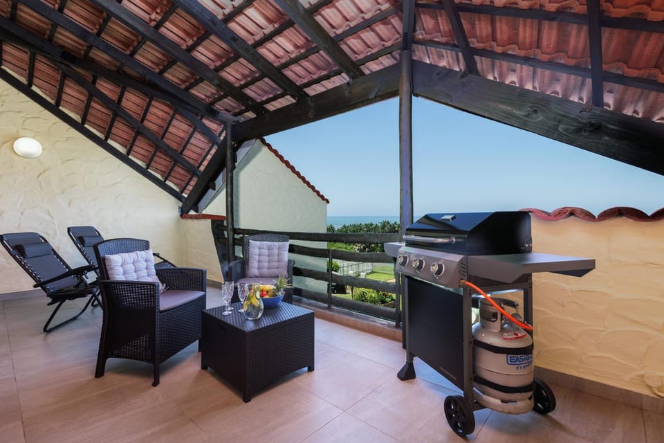 Balcony/Terrace, Seating area, Pool view, Sea view