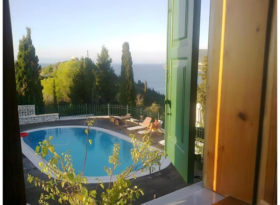 Property building, Living room, Swimming pool
