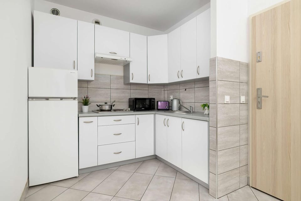 Kitchen or kitchenette, oven, stove, toaster