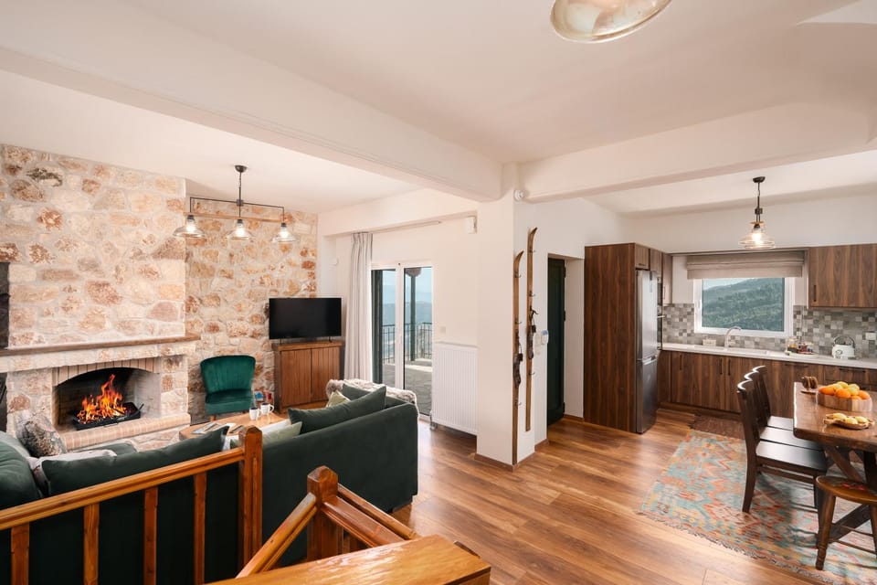 Living room, Photo of the whole room, Seating area, Dining area, fireplace, kitchen