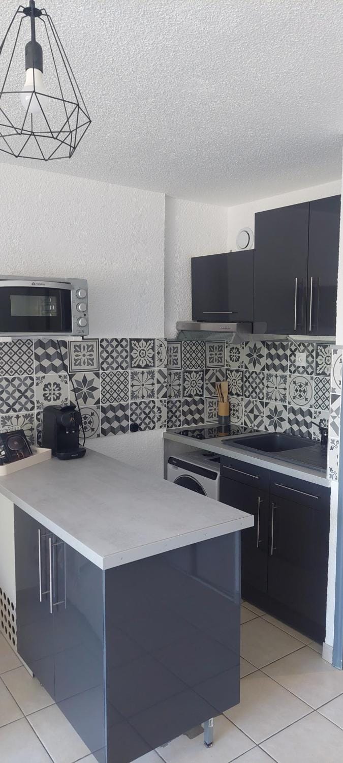 Kitchen or kitchenette, stove