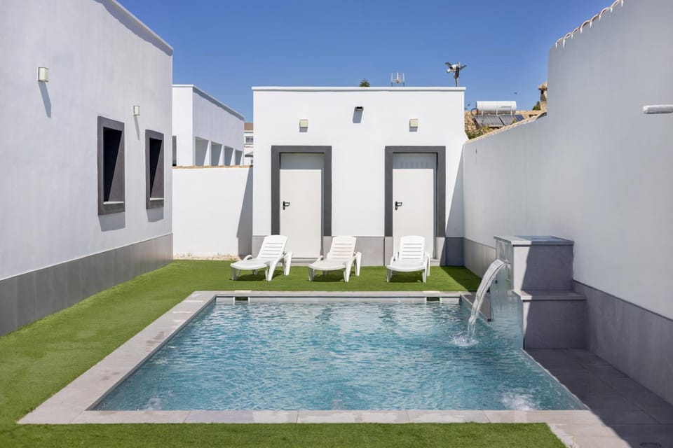 Property building, Living room, Swimming pool
