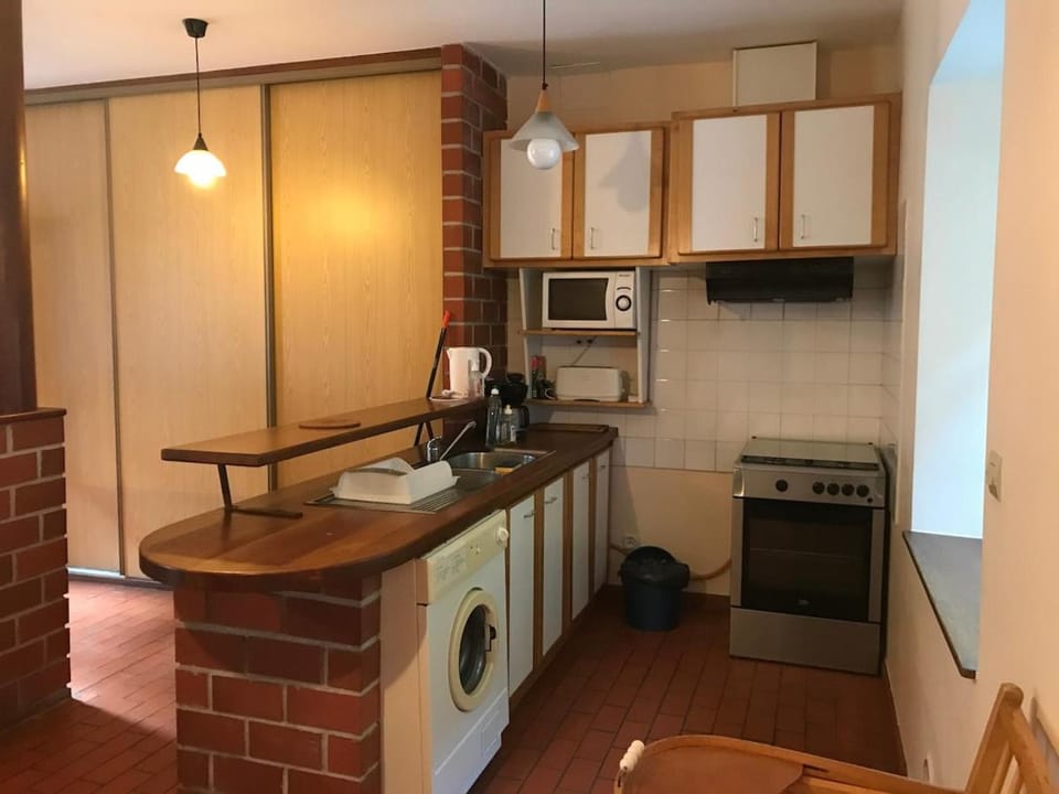 Kitchen or kitchenette, oven, stove, toaster