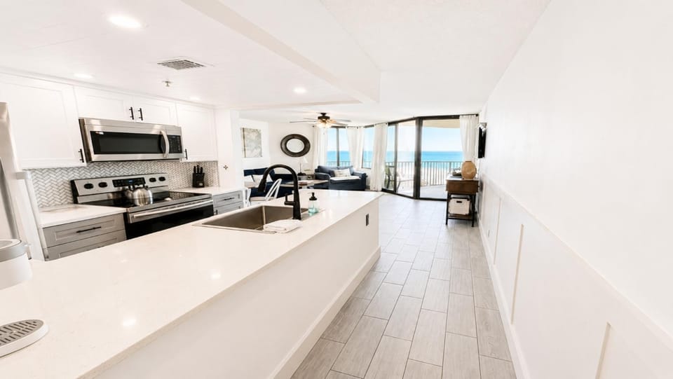 Living room, microwave, oven, stove, kitchen