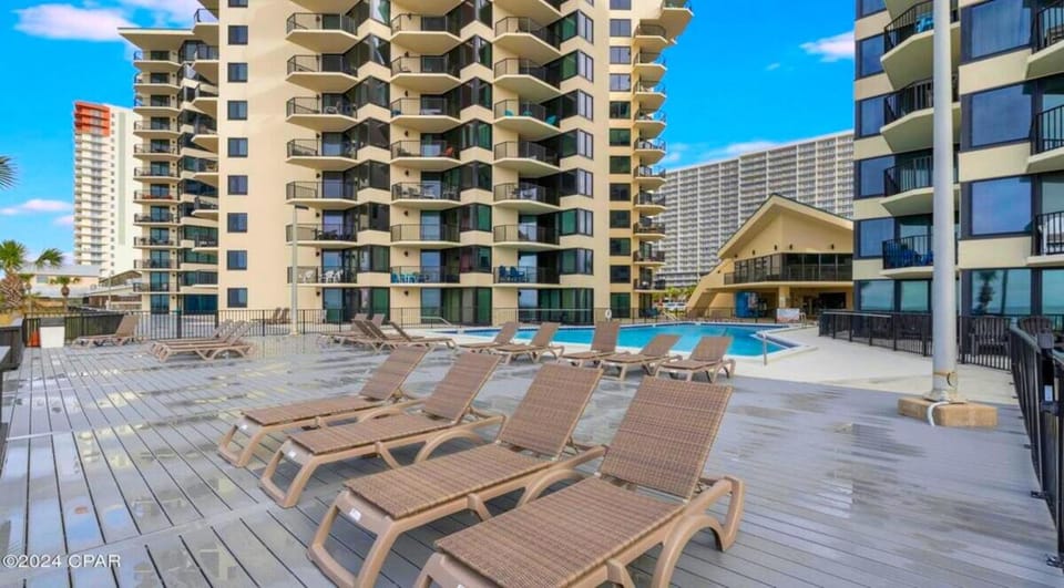 Property building, View (from property/room), Pool view, Swimming pool, sunbed
