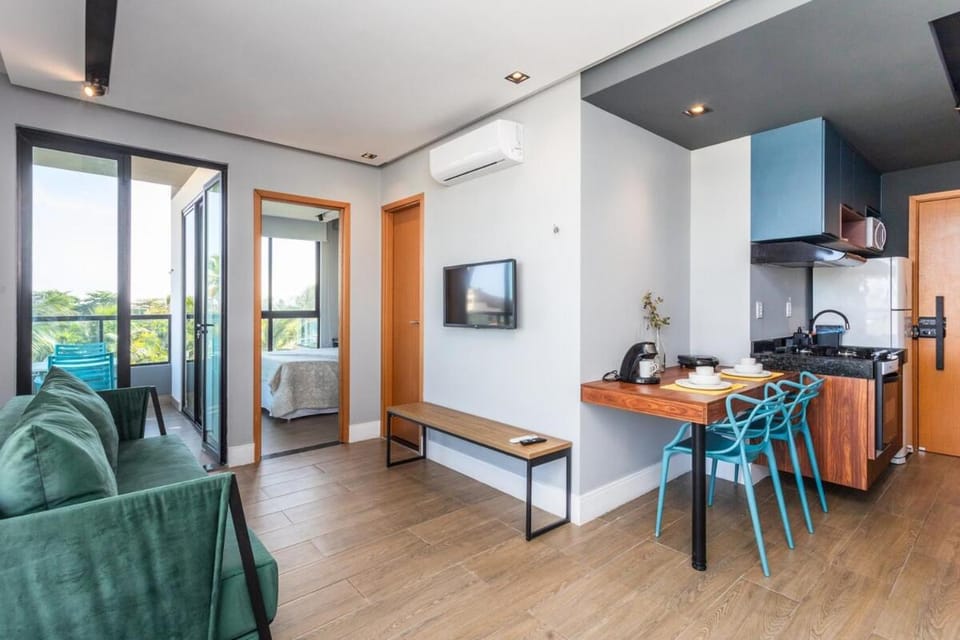 TV and multimedia, Kitchen or kitchenette, Living room, Seating area, air conditioner