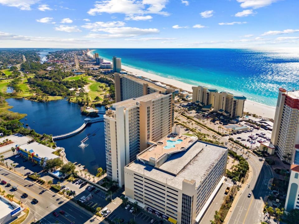 Teal Seaside Escape at Laketown Wharf 1738 by InJoy Vacations House in Panama City Beach