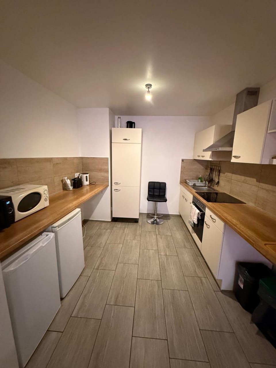 Kitchen or kitchenette, oven, stove, toaster