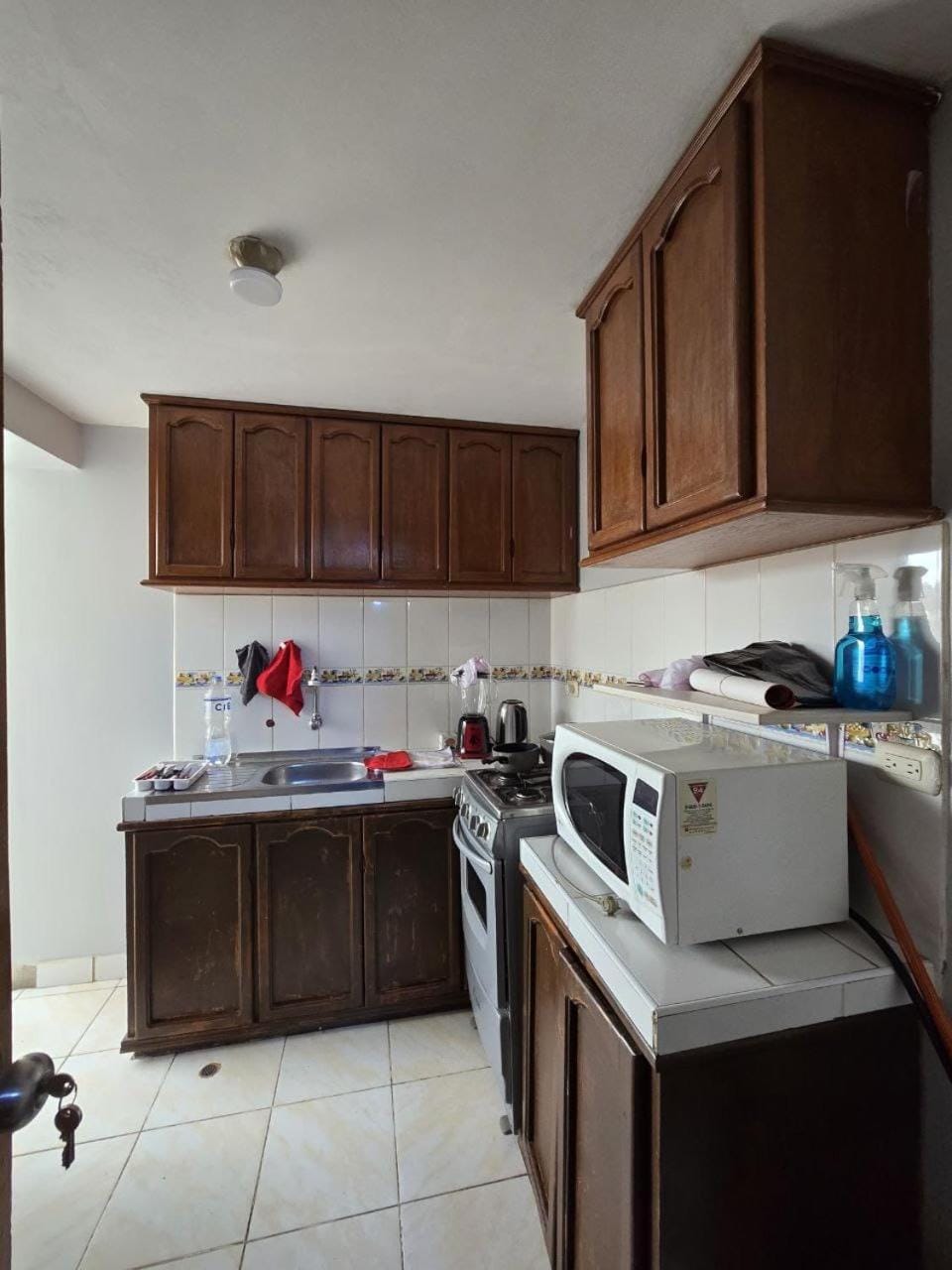 Kitchen or kitchenette, oven, stove, toaster