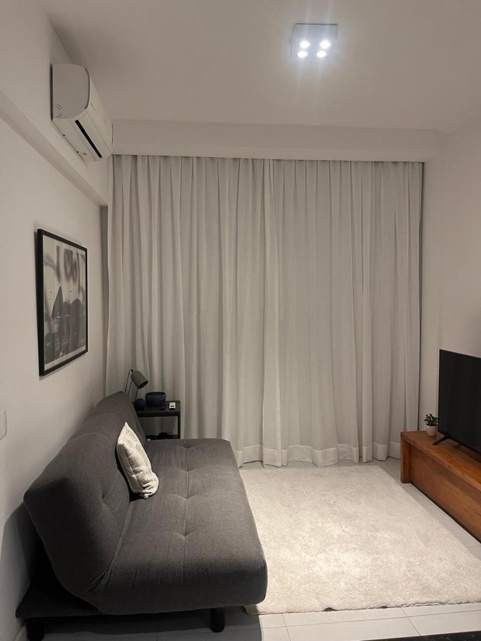 Communal lounge/ TV room, Living room, Seating area, air conditioner