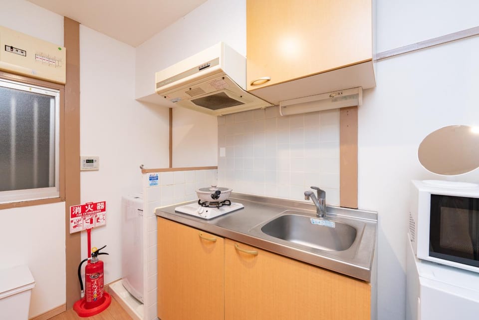 Kitchen or kitchenette, stove