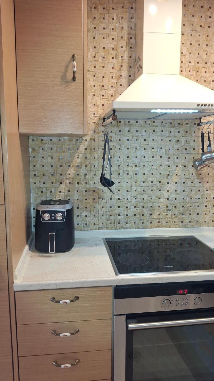 Kitchen or kitchenette, stove