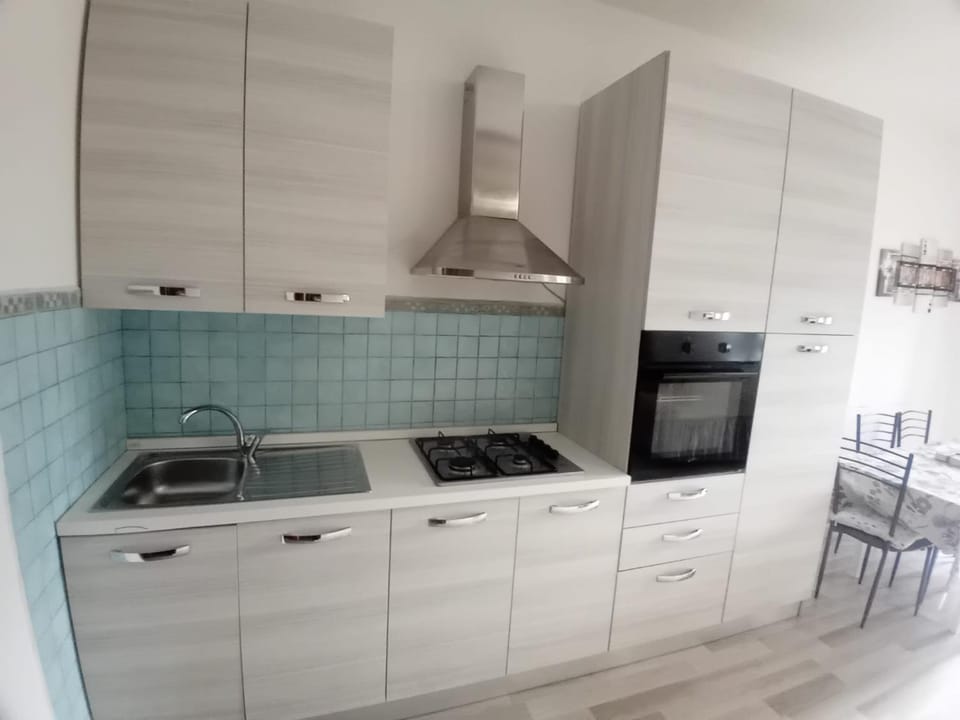 Kitchen or kitchenette, stove, kitchen