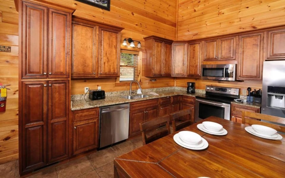 Kitchen or kitchenette, Dining area, dishwasher, oven, stove, toaster