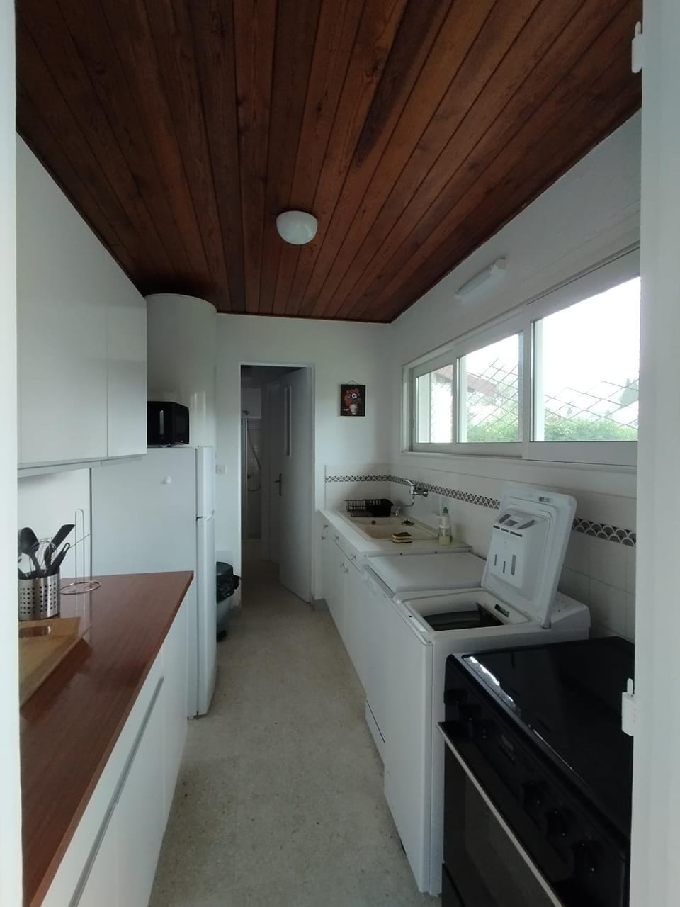 Kitchen or kitchenette, oven, stove