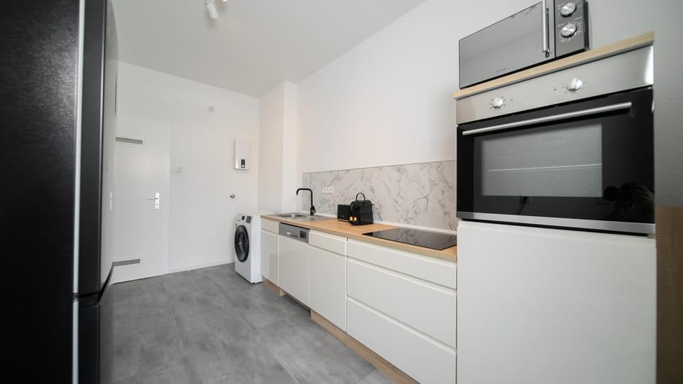 Kitchen or kitchenette, oven, stove, toaster