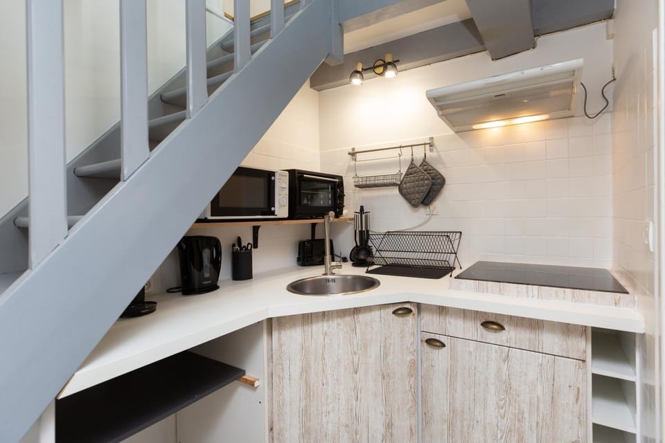 Kitchen or kitchenette, stove