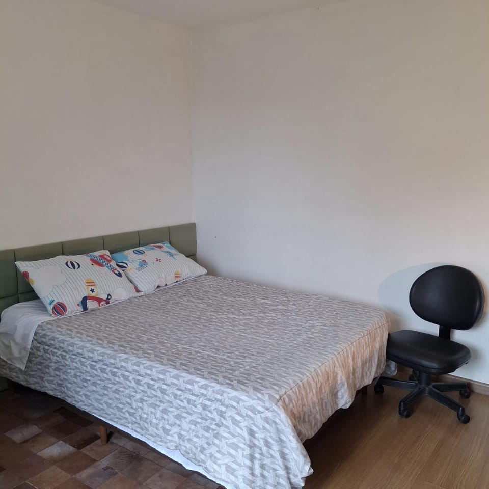 Quarto aconchegante Vacation rental in Curitiba