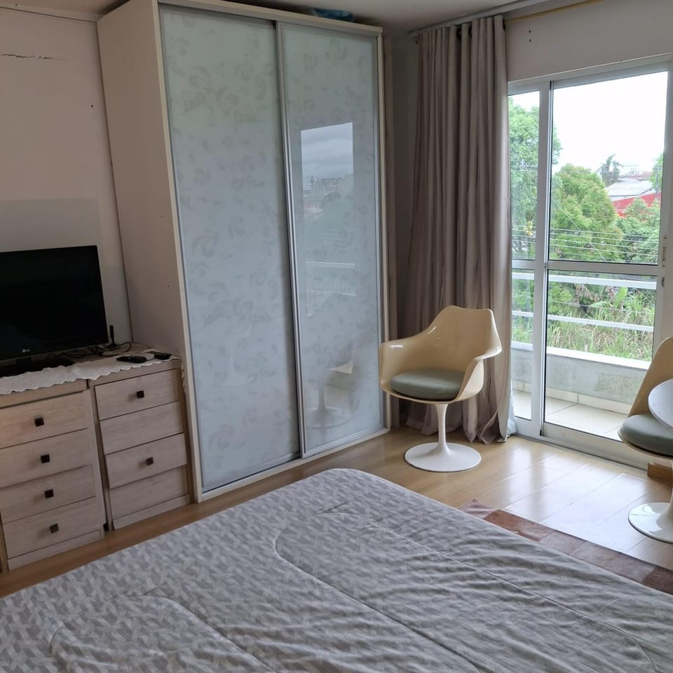 Quarto aconchegante Vacation rental in Curitiba