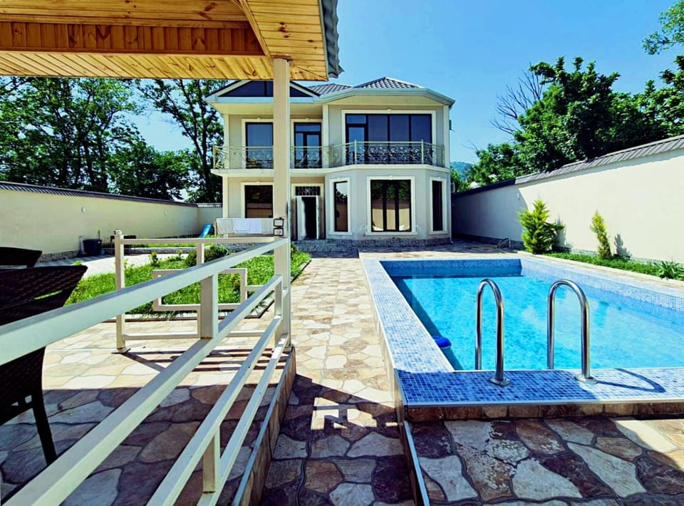 Property building, Patio, Day, Garden, Garden view, Pool view, Swimming pool, sunbed