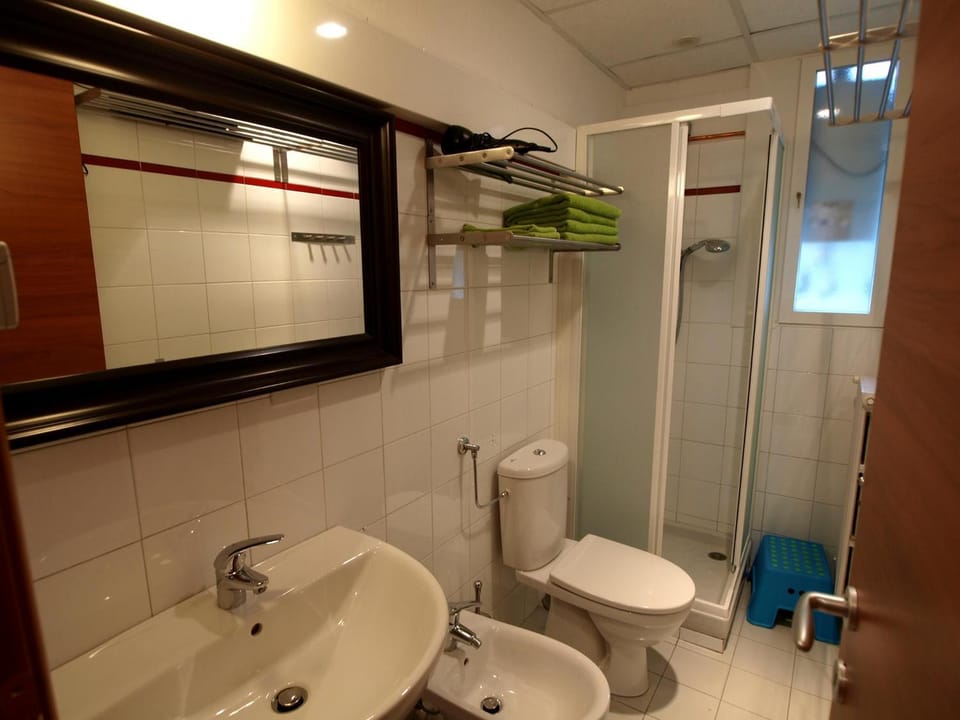 Shower, Toilet, Bathroom, bidet, hair dryier, towels