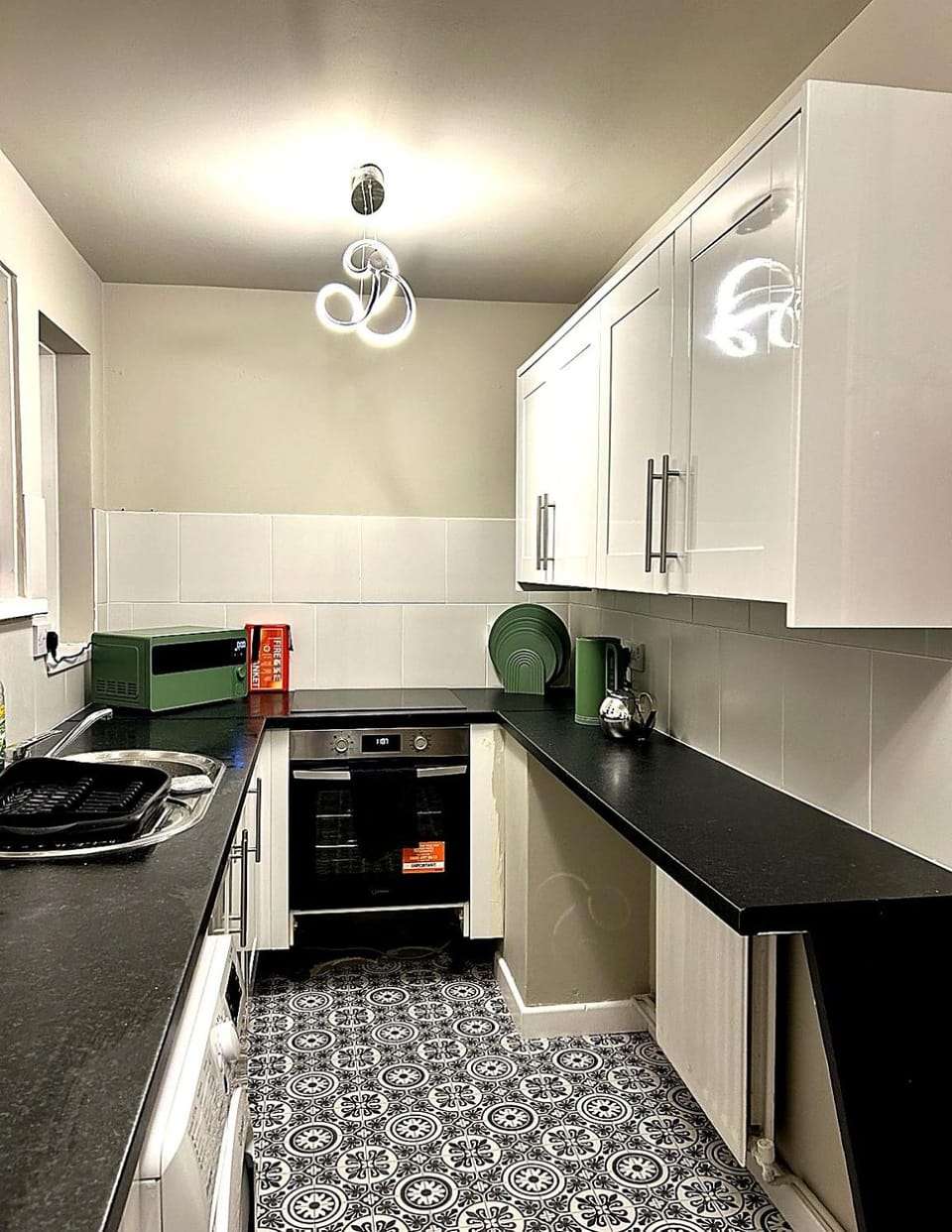Kitchen or kitchenette, oven, stove