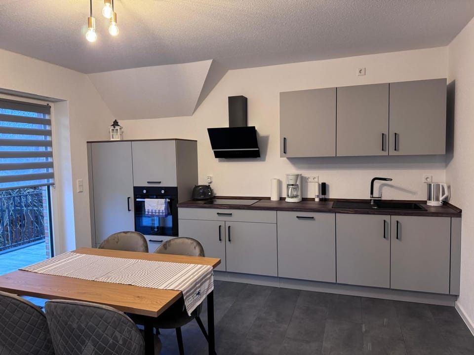 Kitchen or kitchenette, Dining area, oven, stove, toaster