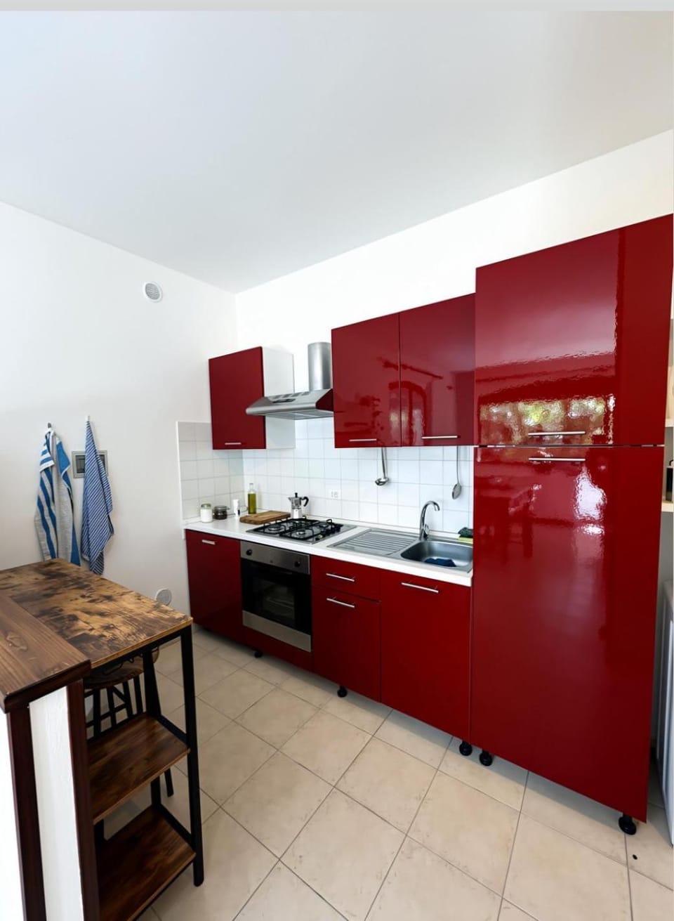 Kitchen or kitchenette, dishwasher, microwave, oven, stove, washing machine